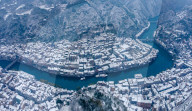 NEWS - China: Schneebedeckte historische Stadt Zhenyuan