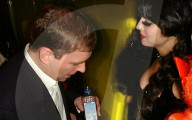 Prince Andrew is seen chatting to German supermodel Heidi Klum at a Hookers and Pimps-themed Halloween party held in New York in October 2000.