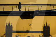 Commuters at sunrise on a cold day in London, UK.