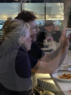 Kim Basinger and her hair stylist boyfriend of more than seven years Mitch Stone are seen together for the first time in three and a half years as they enjoy a dinner date watching Saturday Night Football in the San Fernando Valley.