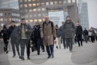 Commuters going back to work in London