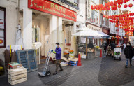 China Town receive their food deliveries ahead of the Chinese New Year celebrations, London.