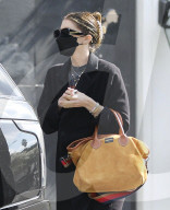 PREMIUM EXCLUSIVE Katherine Schwarzenegger Hides Growing Baby bump Beneath Long Black Overcoat