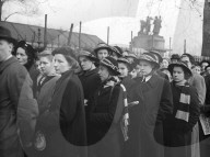 SCHOOLCHILDREN IN THE LONG QUEUE TO PAY HOMAGE TO THE KING 12-2-52
PHOTO SHOWS :- 4000 people every hour have been filing past the catafalque in London's Westminster Hall today where the late King George vi is lying in state.  In the long queue which str