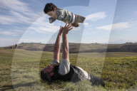 Flying high: how a photo of a Syrian father and son led to a new life in Italy.