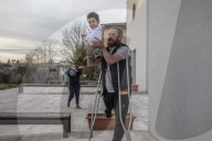 Flying high: how a photo of a Syrian father and son led to a new life in Italy.