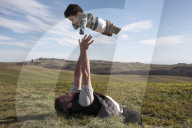 Flying high: how a photo of a Syrian father and son led to a new life in Italy.