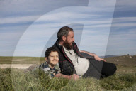 Flying high: how a photo of a Syrian father and son led to a new life in Italy.