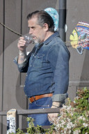 A beaming Hunter Biden puts his mounting scandals aside to enjoy a two-hour lunch with friends at a fish restaurant in Malibu. 