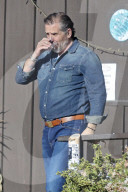 A beaming Hunter Biden puts his mounting scandals aside to enjoy a two-hour lunch with friends at a fish restaurant in Malibu. 