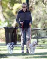 Former James Bond girl Maud Adams cuts a youthful and athletic figure as she enjoys an afternoon dog walk right before her 77th birthday.