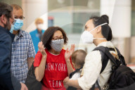 Families reunited as Australia’s border opens to tourists.