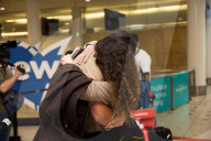 Families reunited as Australia’s border opens to tourists.