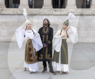 Kyrgyzstan artists in their national dress in Trafalgar Square, London