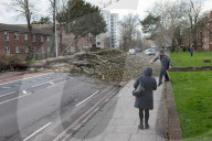 An almighty crash’ – battered Britain still reeling at the havoc wreaked by Storm Eunice