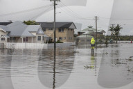 Ballina flood: thousands of homes impacted with ‘peak to continue for a number of hours’
Mayor of northern NSW town calls for help, saying water ‘is still coming full force towards us’