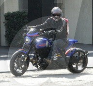 Keanu Reeves takes delivery of some flashy new wheels as he and girlfriend Alexandra Grant are spotted nesting in LA whilst enjoying some rare down time together. 