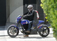 Keanu Reeves takes delivery of some flashy new wheels as he and girlfriend Alexandra Grant are spotted nesting in LA whilst enjoying some rare down time together. 