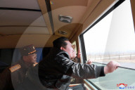 NEWS -  Nordkoreas Führer Kim Jong Un beim Test seiner neuen Interkontinentalrakete