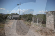 Battle-scarred ghost town bears mute witness to Mexico’s drug wars. The army has reclaimed the village school that became a battlefield but few believe gangs’ bloody reign has ended