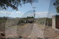 Battle-scarred ghost town bears mute witness to Mexico’s drug wars. The army has reclaimed the village school that became a battlefield but few believe gangs’ bloody reign has ended