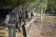 Battle-scarred ghost town bears mute witness to Mexico’s drug wars. The army has reclaimed the village school that became a battlefield but few believe gangs’ bloody reign has ended