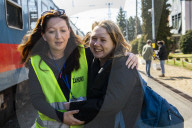 Hands of hope reach out to refugees with desperate tales of Kyiv escape