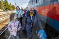 Hands of hope reach out to refugees with desperate tales of Kyiv escape