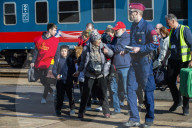 Hands of hope reach out to refugees with desperate tales of Kyiv escape