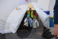 Hands of hope reach out to refugees with desperate tales of Kyiv escape