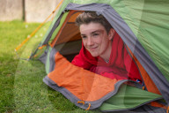 Devon’s ‘boy in the tent’ heads indoors after two-year camp out
Max Woosey, who raised more than £700k for his local hospice, will be spending less time under canvas – to his family’s relief