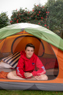 Devon’s ‘boy in the tent’ heads indoors after two-year camp out
Max Woosey, who raised more than £700k for his local hospice, will be spending less time under canvas – to his family’s relief