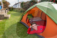 Devon’s ‘boy in the tent’ heads indoors after two-year camp out
Max Woosey, who raised more than £700k for his local hospice, will be spending less time under canvas – to his family’s relief
