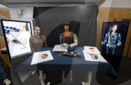 Ai-Da Robot painting at the British Library, Elliott Room, London,UK.
