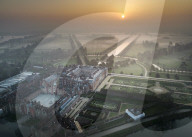 Sun rises over a misty River Thames
