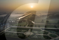 Sun rises over a misty River Thames