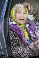 Red Cross volunteers distribute food and aid at Csengersimai on the Hungary Romania border.