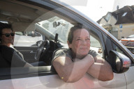 Red Cross volunteers distribute food and aid at Csengersimai on the Hungary Romania border.