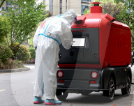 NEWS - Coronavirus: Pandemie in Shanghai: Unbemannte Lieferfahrzeuge versorgen die Einwohner mit Hilfsgütern