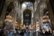 Worshipers attend a service at St. Volodymyr's Cathedral in Kyiv, Ukraine.