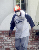 1980s TV icon Mr T is all covered up in an orange beanie and face mask as he shuffles around his LA neighborhood a few weeks before his 70th birthday.