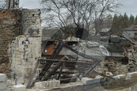 Charred houses, cratered lawns and an epic clean-up on road to Chernihiv