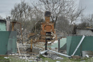 Charred houses, cratered lawns and an epic clean-up on road to Chernihiv