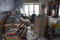 Charred houses, cratered lawns and an epic clean-up on road to Chernihiv