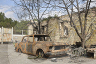 Charred houses, cratered lawns and an epic clean-up on road to Chernihiv