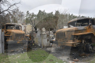 Charred houses, cratered lawns and an epic clean-up on road to Chernihiv