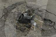 Charred houses, cratered lawns and an epic clean-up on road to Chernihiv