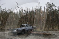 Charred houses, cratered lawns and an epic clean-up on road to Chernihiv
