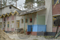 Charred houses, cratered lawns and an epic clean-up on road to Chernihiv