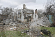 Charred houses, cratered lawns and an epic clean-up on road to Chernihiv